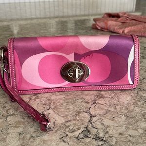 Super cute RARE coach handbag! Beautiful fun colors! Satin type finish.